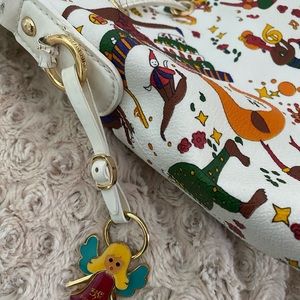 Magic Circus large white drawstring bucket bag.